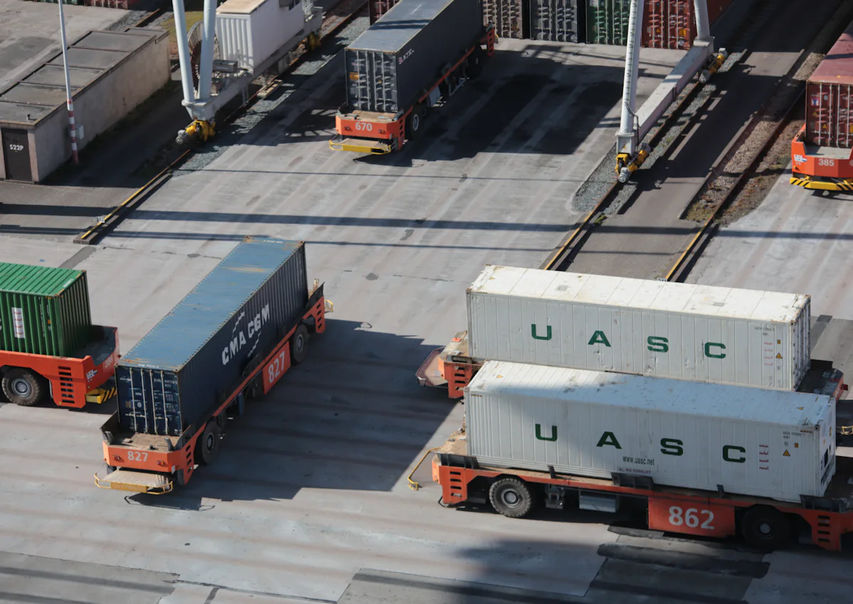 Container trucks moving through a port terminal