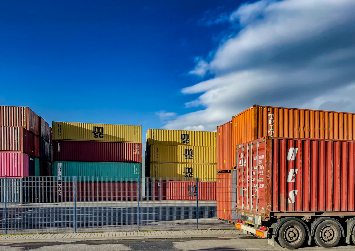 A container truck leaving a container yard
